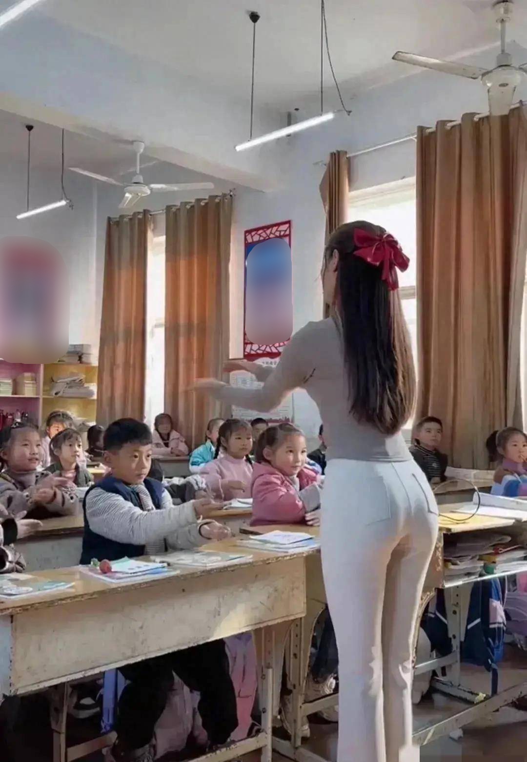 Cô giáo "khổ sở" vì bóng lưng quá đẹp, chỉ diện quần jeans thôi đã khiến dân mạng phải tranh cãi- Ảnh 2.
